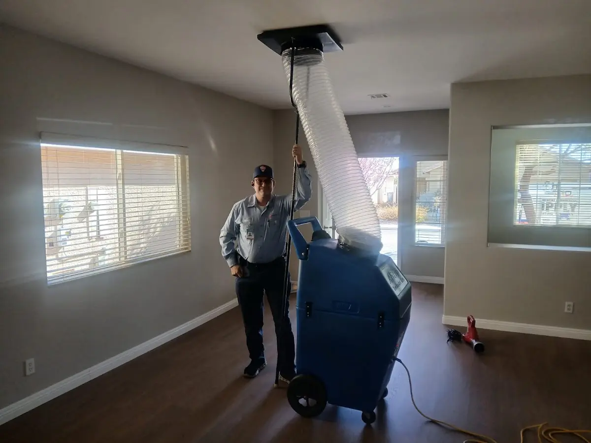 Professional Dryer Vent Cleaning work inside a Riverside home